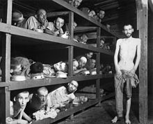 https://upload.wikimedia.org/wikipedia/commons/thumb/d/dc/Buchenwald_Slave_Laborers_Liberation.jpg/220px-Buchenwald_Slave_Laborers_Liberation.jpg